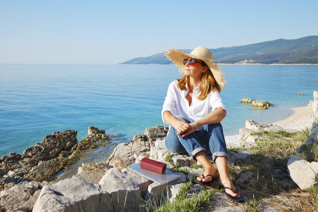 Lady sat by the sea - Pensions Page